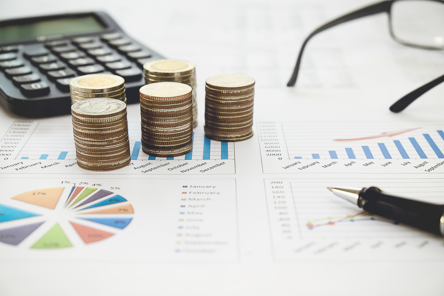 Row of Coins,Calculator with Account Book Finance